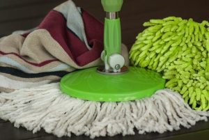 Mopping and dusting during spring cleaning. 